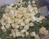 Foto del passaggio 3 della ricetta Sformato di riso agli spinaci con salsiccia dei nebrodi