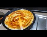 A picture of step 11 of Schezwan Cheese Dosa.