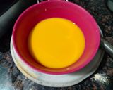 A picture of step 2 of Custard powder halwa with roasted sesame seeds.