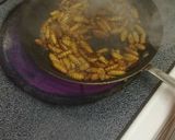 A picture of step 3 of Fried silk worms.