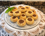 Foto del paso 14 de la receta: Delicias de coco rellenas de dulce de leche