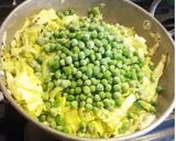 A picture of step 3 of Stir fried Cabbage, green peas, bok choy stuffed Pita bread.