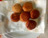 A picture of step 7 of Bread Meatballs in Tomato Sauce.