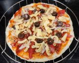 A picture of step 5 of Italian pizza.