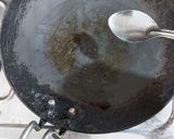 A picture of step 3 of Suji uttapam with sauce.
