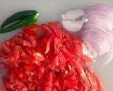 A picture of step 2 of Achari chicken.