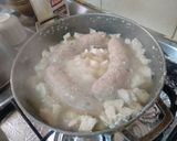 Foto del paso 4 de la receta: Arroz con pollo, salchicha ranchera y longaniza