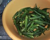 A picture of step 1 of Punjabi Style Bhindi Masala.