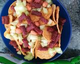 A picture of step 5 of Tostilocos.