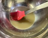 A picture of step 7 of Baked Glazed Donuts.
