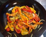 A picture of step 3 of Colorful Fry Pan Peppers and Onions.