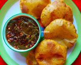 A picture of step 7 of Sarson Ka Saag and Makki Methi Poori.