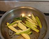 A picture of step 6 of Katla fish curry with raw mango.