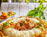 A picture of step 8 of Saucy Crispy chicken with rice fries and vegetable.