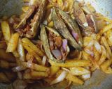 A picture of step 6 of Onion Stuffed Karela.