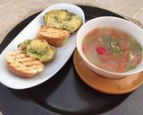 A picture of step 3 of Thai vegetables soup with baked cheesy potatoes.