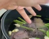 A picture of step 2 of Oxtail Soup Thai style with Herbs.