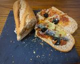 A picture of step 6 of Sardine and Caramelized Onion Sandwich.