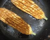 A picture of step 4 of Baingan Bhaja.