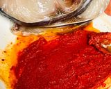 A picture of step 1 of Fried king fish.