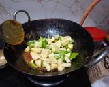 A picture of step 1 of Aloo Shimla mirch without onion garlic.