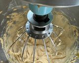 A picture of step 3 of Gluten Free~ Almond and Cocoa Truffles covered in Vanilla or Milk Chocolate.