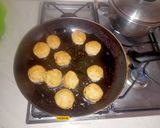 A picture of step 6 of Bread Meatballs in Tomato Sauce.
