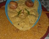 A picture of step 15 of Malai kofta with white gravy curry.