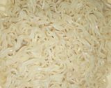 A picture of step 1 of Indomie noodles and beef stew.