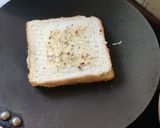 A picture of step 4 of Cheesy garlic bread.