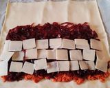 Foto del paso 3 de la receta: Trenza de chistorra, cebolla roja caramelizada y parmigiano reggiano