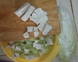 Foto langkah ke 3 dari resep Tumis sawi tahu cina.