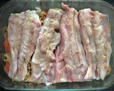 Foto del paso 4 de la receta: Lubina al horno con patatas
