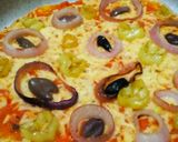 صورة لخطوة 16 من وصفة بيتزا🍕Pizza🍅🍟