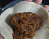 A picture of step 12 of Anjeer gud ki puran poli.