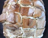 A picture of step 1 of Baked Cheese Pull-Apart Bread.