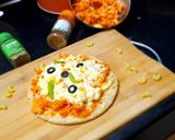 A picture of step 9 of Macroni pizza.