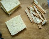 A picture of step 3 of Peanut Butter French Toast Roll-Ups With Banana & Almond Filling.