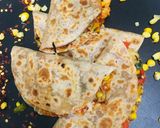 A picture of step 7 of Left over Roti tacos.