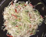 A picture of step 4 of Chinese Rice with Korean Egg Rolls.