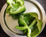 A picture of step 4 of Quinoa Stuffed Cheesy Capsicum (Baked).