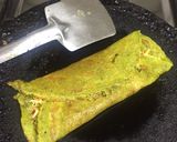 A picture of step 7 of Spinach Cheela wraps.