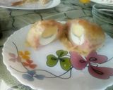 A picture of step 5 of Egg wrapped in sausage and puff.