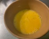 A picture of step 8 of Scrambled Eggs with Green Peppers, Red Onion, and Coulommiers Cheese.