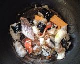 A picture of step 2 of Fried Rice with Sushi .