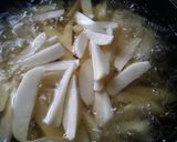 A picture of step 3 of Fried potatoes, plantain,egg n tea.