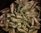 A picture of step 4 of Penne pasta in basil pesto.