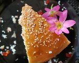 A picture of step 14 of Dilkush or sweet bread with coconut and tutti frutti filling.