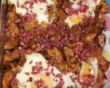 Foto del paso 8 de la receta: Patatas especiadas al horno con huevo y virutas de jamón