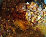 A picture of step 4 of Sindhi sai bhaji with yellow rice.